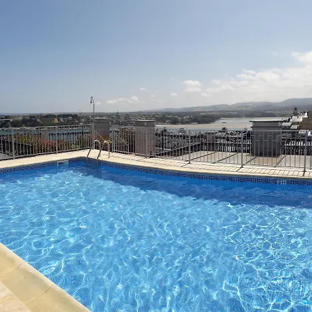 Апартаменты Atico Con Terraza Y Piscina Comunitaria